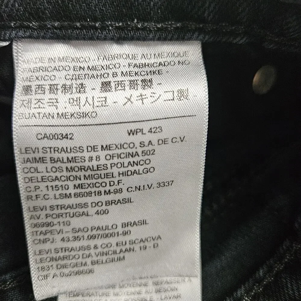 Levi's Men's Regular Fit Jean, 33Wx32L measures 31.5 Black VGUC